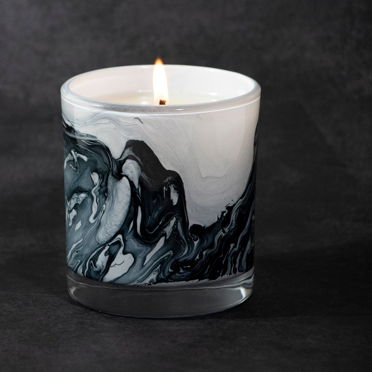 White Sage & Lily 14 oz. Swirl Glass Candle by Andaluca Home