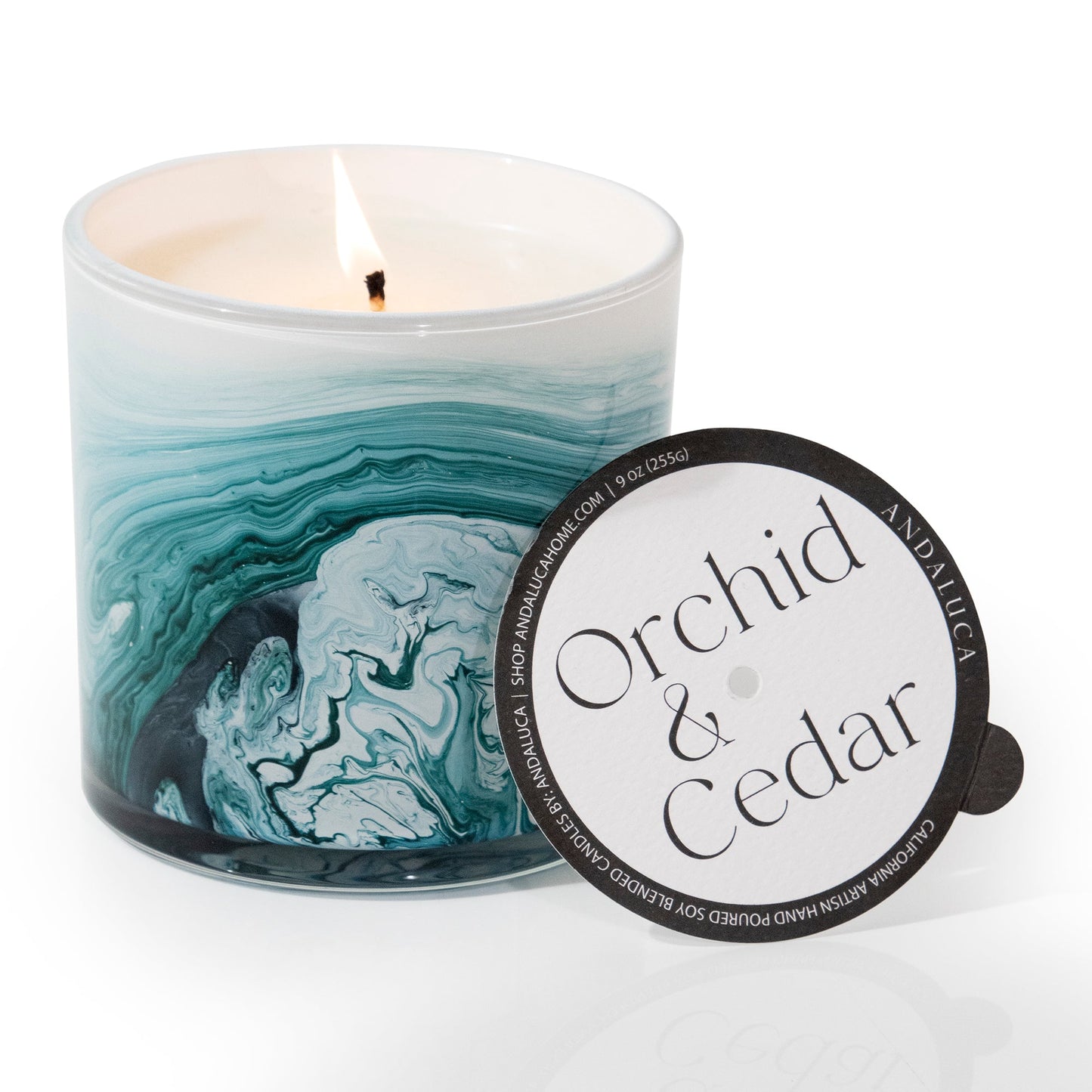 Orchid & Cedar 9 oz. Swirl Glass Candle by Andaluca Home